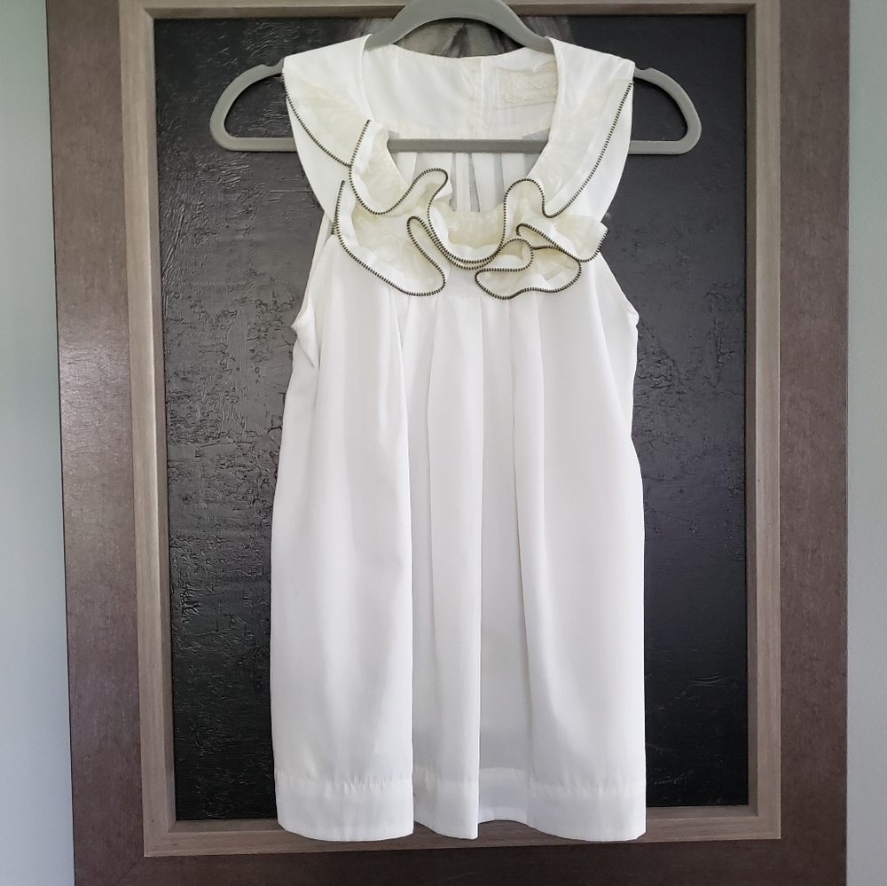 Unique sleeveless top